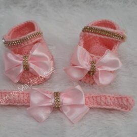 Crochet handmade baby girl shoes and headband set.