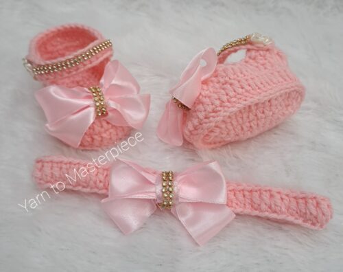 Crochet handmade baby girl shoes and headband set.