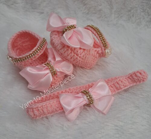 Crochet handmade baby girl shoes and headband set.