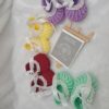 Crochet baby girl booties with beads.