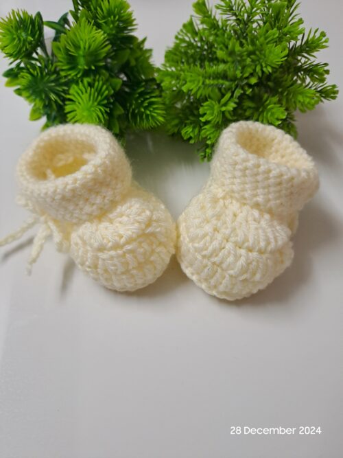 Crochet handmade baby shoes.