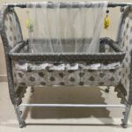 Spacious Baby Swing with Bedding, Mosquito Net, and Wheel Brakes