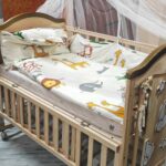 Pre-Owned 12-in-1 Natural Wooden Baby Bed Cot with Mosquito Net