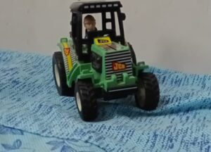 Preowned Shinsei SI Green Tractor Toy