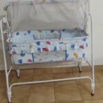Preowned Baby Cradle with Mosquito Net & Wheels