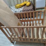 Preowned Montana wooden cot cum rocker