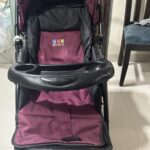 Pre-Owned Stroller with 4 Double Wheels, Lock, and Shade Cover