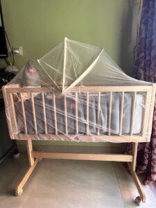 Preowned MeeMee Wooden Baby Cradle with Mattress, Pillow & Mosquito Net