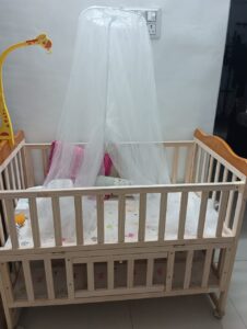 Preowned MeeMee Wooden Baby Cot