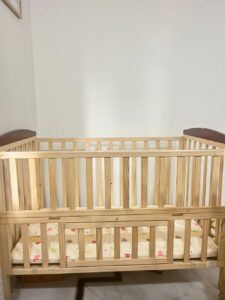 Pre-Owned MeeMee Wooden Baby Cot with Mattress & Mosquito Net