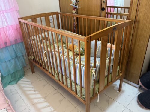 Babyhug wooden cot with 3 level height adjustment with mattress along with bedding set