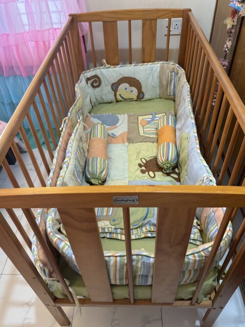 Babyhug wooden cot with 3 level height adjustment with mattress along with bedding set