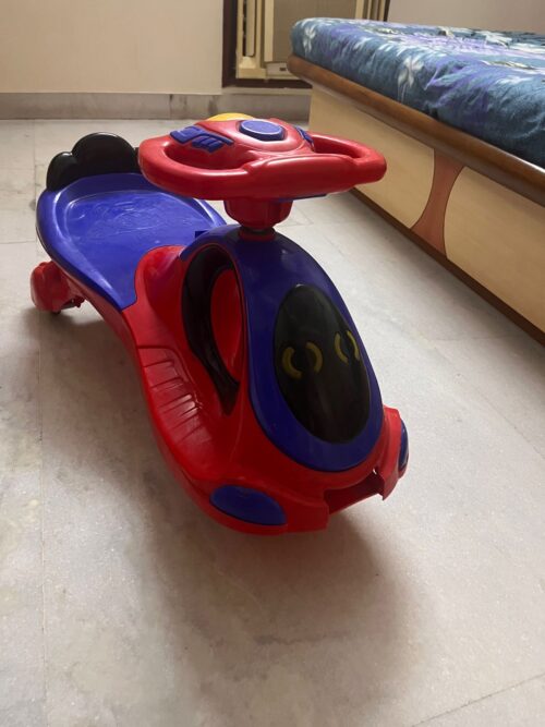 Swing Car for Kids – Blue & Red | Gently Used | Smooth Ride & Fun Playtime