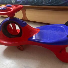 Swing Car for Kids – Blue & Red | Gently Used | Smooth Ride & Fun Playtime